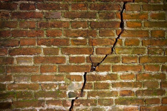 brick wall with large crack