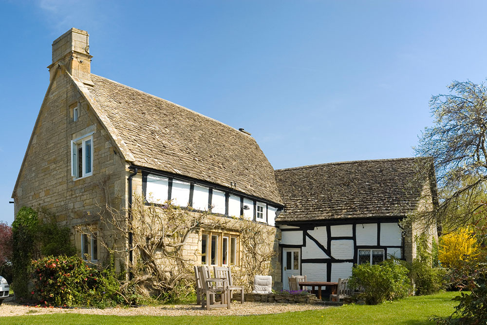 Picture of an old listed country home that would need a building survey report